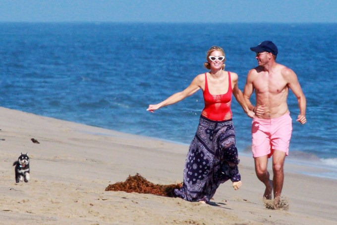 Paris Hilton and boyfriend Carter Reum enjoy a beach day with friends