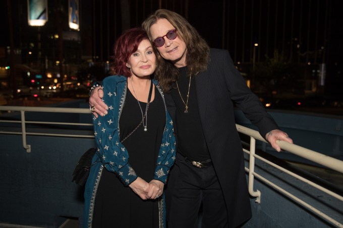 Sharon & Ozzy Osbourne Cuddle While Celebrating Black Sabbath