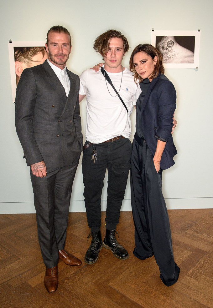 David Beckham Posing With Son Brooklyn And Wife Victoria