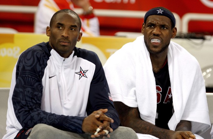 LeBron James and Kobe Bryant sitting