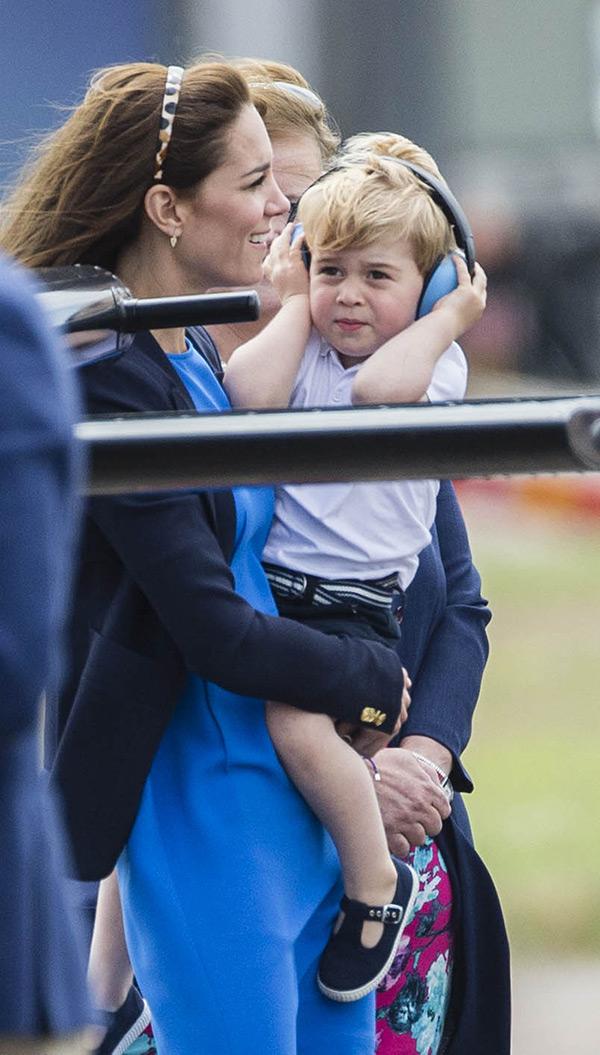 Kate Middleton Holds Prince George