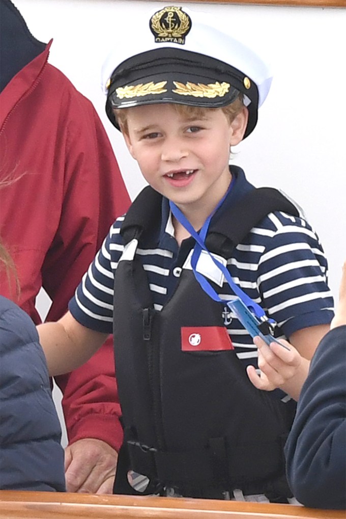 Prince George shows off missing teeth at charity event