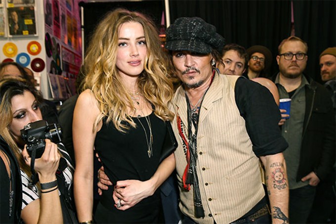 Amber Heard And Johnny Depp At A Stella McCartney Party