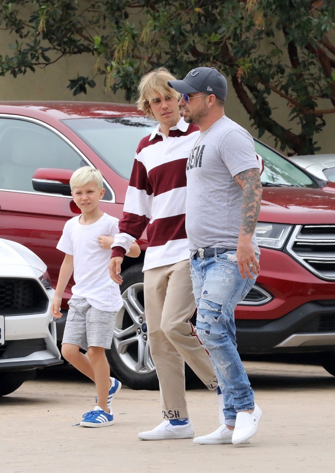 Justin Bieber with his dad, Jeremy, and brother, Jaxon