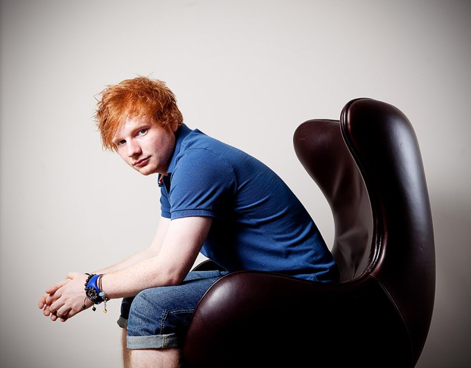 Ed Sheeran poses for a portrait while sitting down