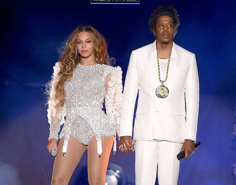 Jay-Z and Beyonce Knowles attend the 2013 NBA All-Star Game at the