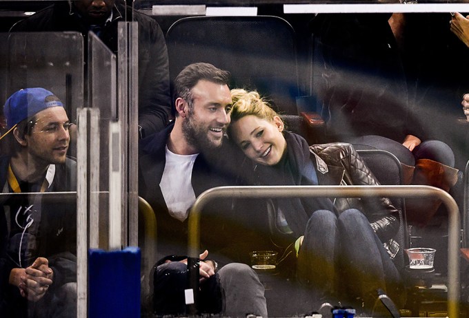 Jennifer Lawrence cuddles with Cooke Maroney