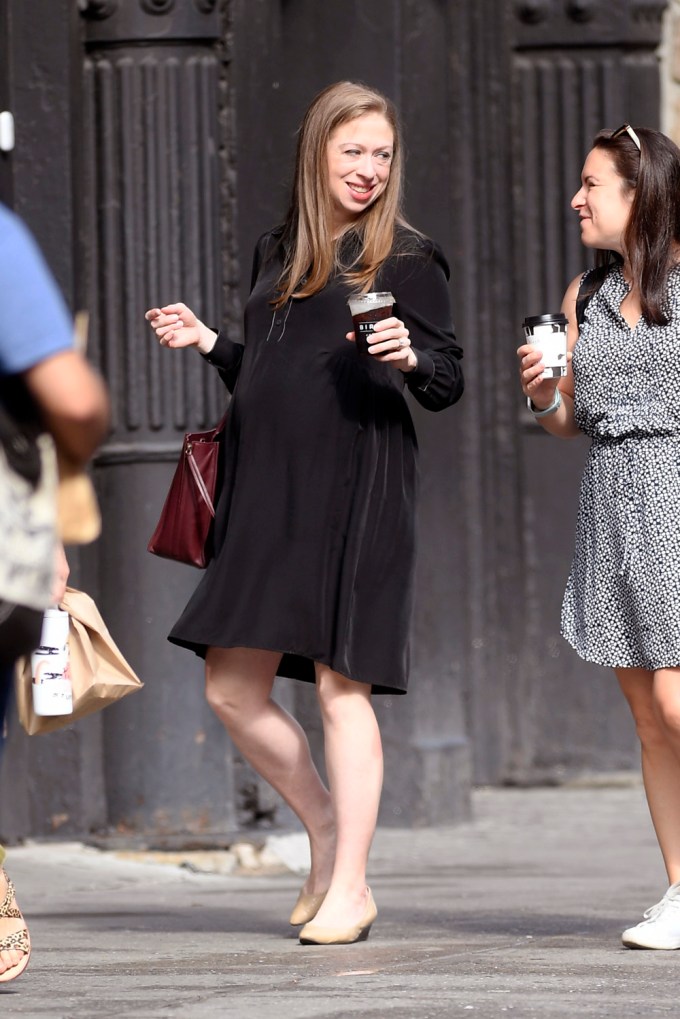 Heavily Pregnant Chelsea Clinton Shows Her Belly Bump While Out For A Business Meeting With A Friend In New York City This Morning