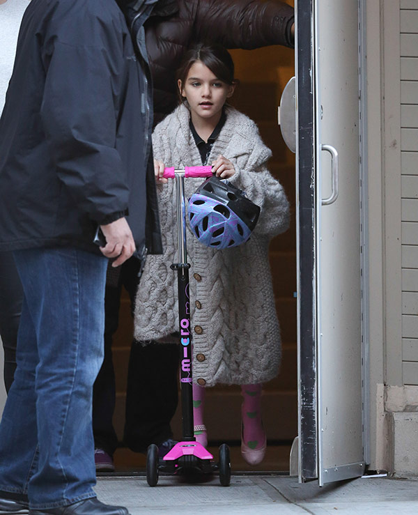 Suri Cruise on a scooter