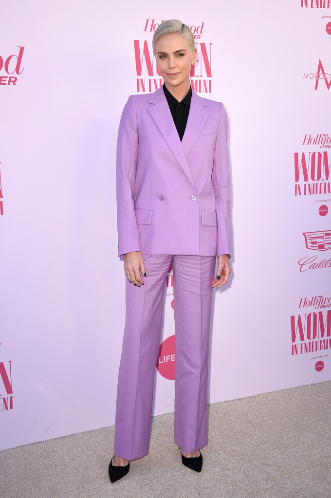 Charlize Theron in a purple suit