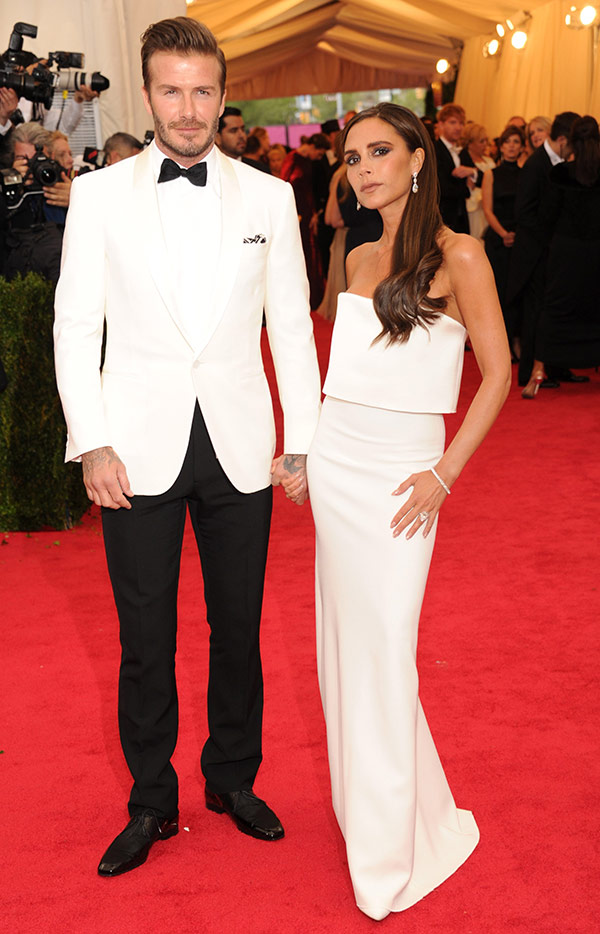 Victoria Beckham and David Beckham in white