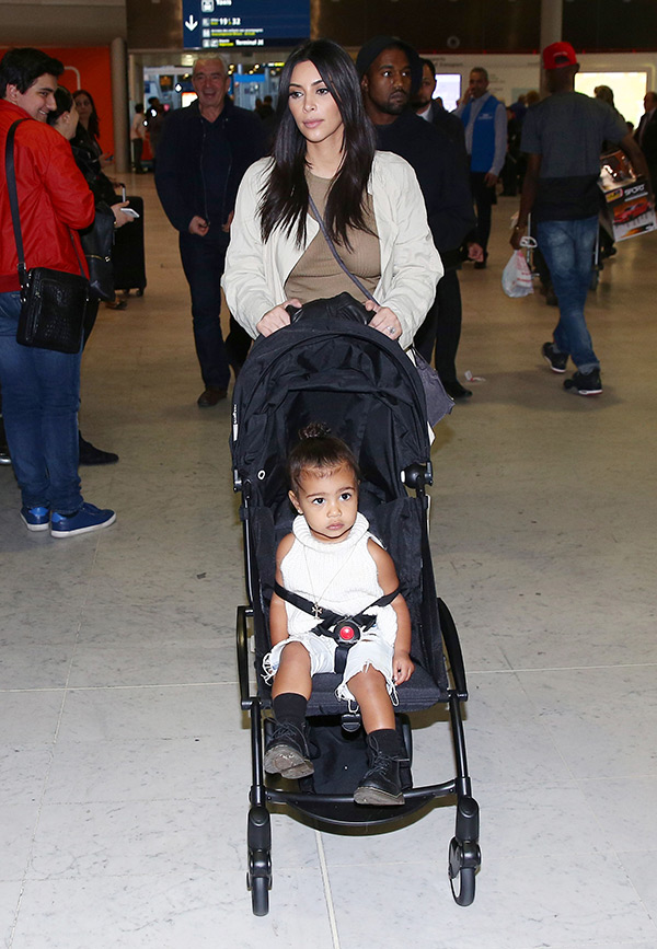 North West & Kim Kardashian At Paris Airport