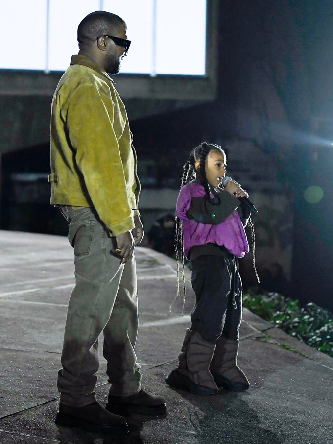 Kanye West & North West on stage