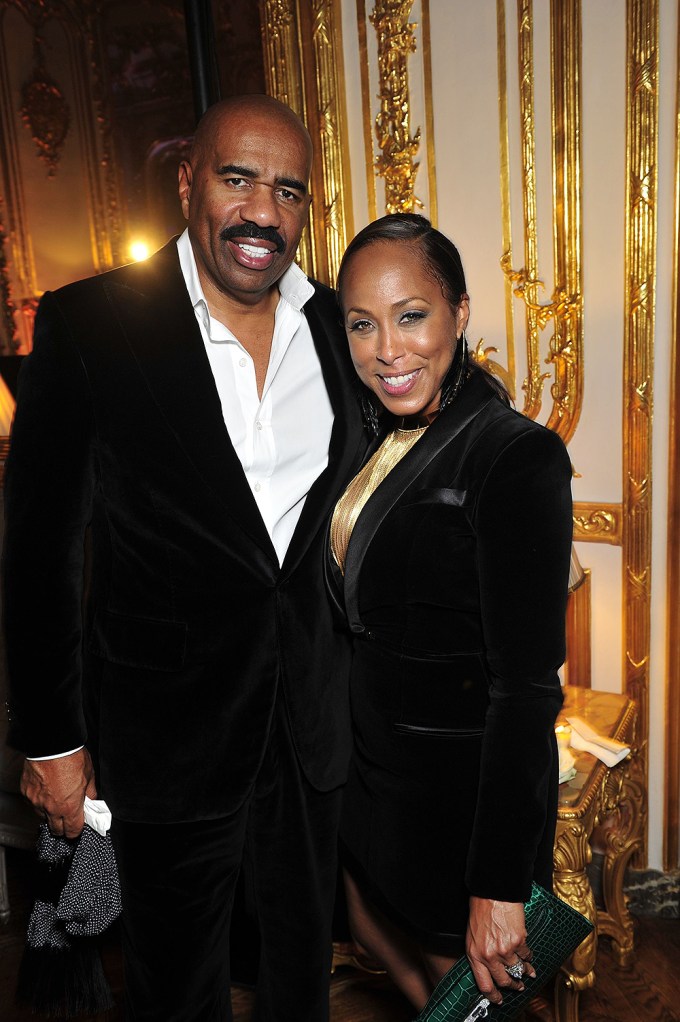 Steve Harvey with his wife at the ELLE France 70th Anniversary party
