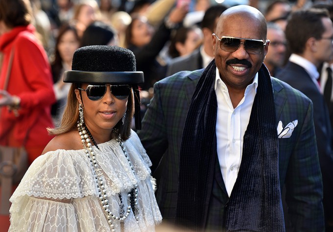 Steve Harvey with his wife at the Chanel Spring-Summer fashion collection