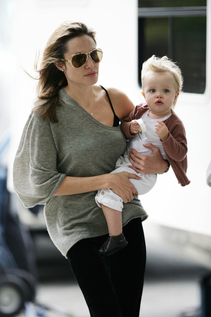 Angelina Jolie carries Shiloh down the street in New York City