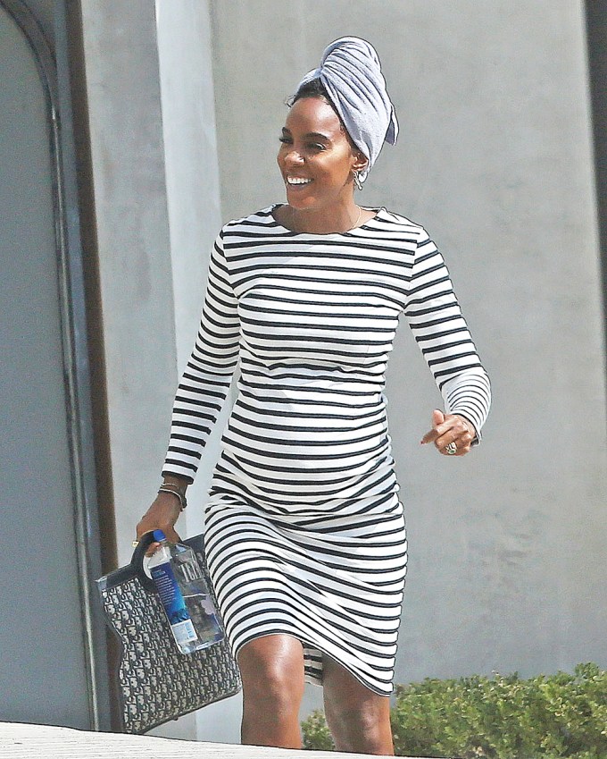 Kelly Rowland rocks a striped dress while pregnant