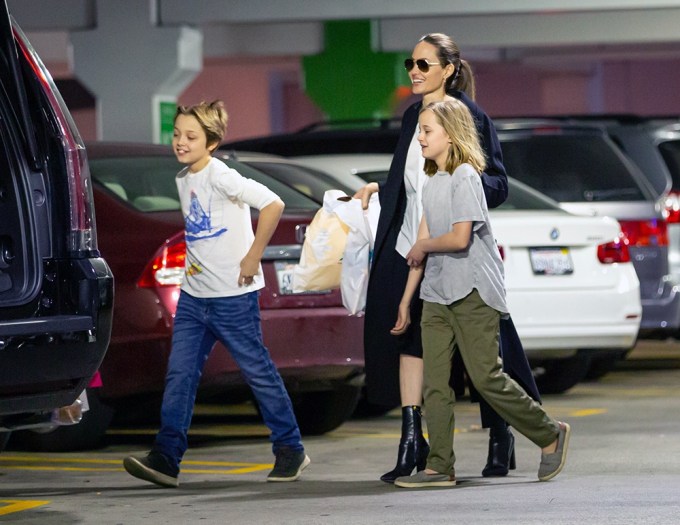 Angelina Jolie goes last-minute Christmas shopping with her twins