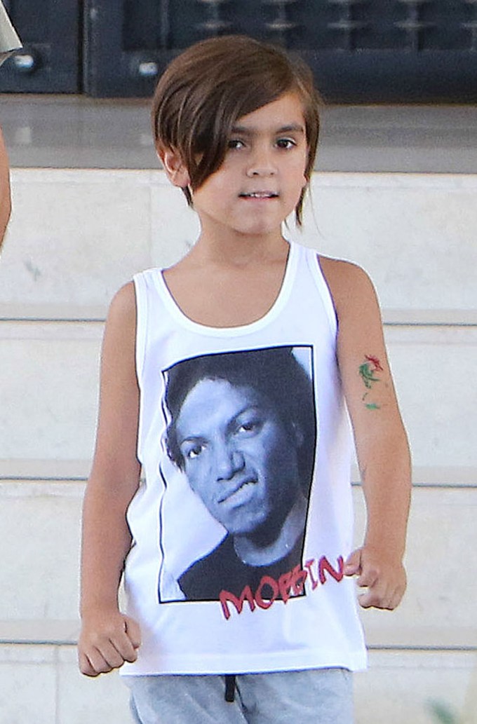Mason Disick showing off a graphic tank top