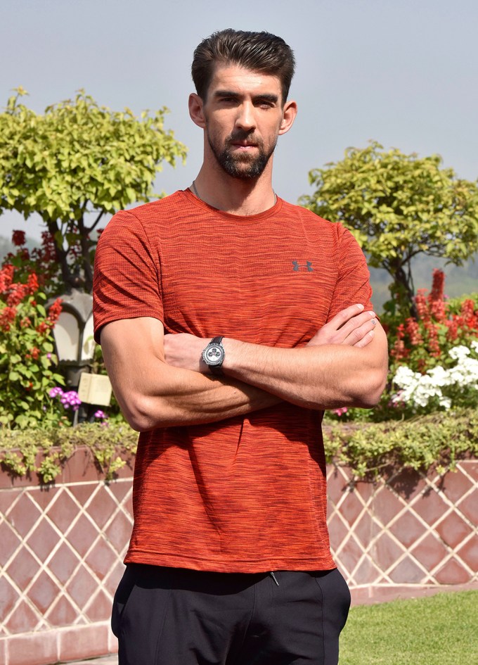 Michael Phelps attends a photocall in New Delhi