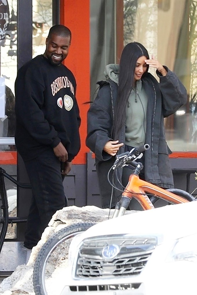 Kim Kardashian & Kanye West walking