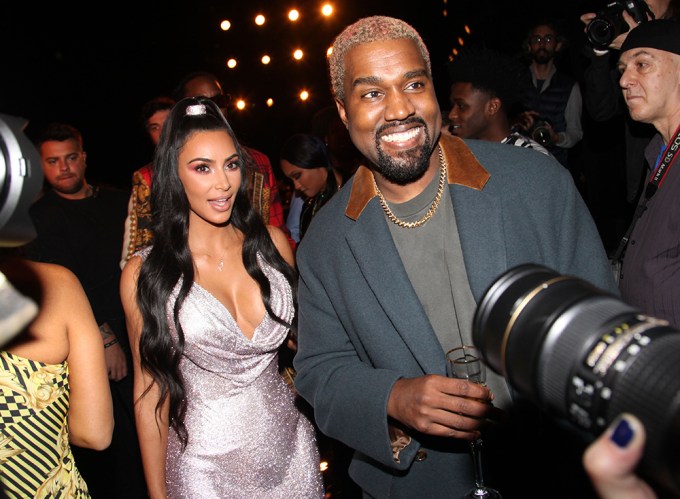 Kim Kardashian and Kanye West At a Versace Show