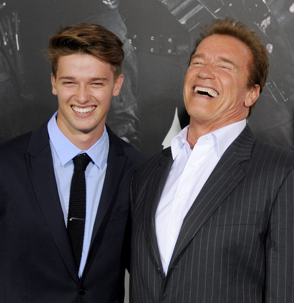Arnold Schwarzenegger (R) and son Patrick Schwarzenegger at the Los Angeles premiere of ‘The Expendables 2’