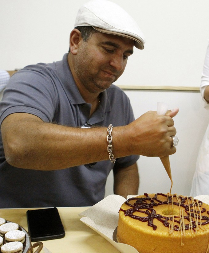 Buddy Valastro Decorating A Cake In Colombia