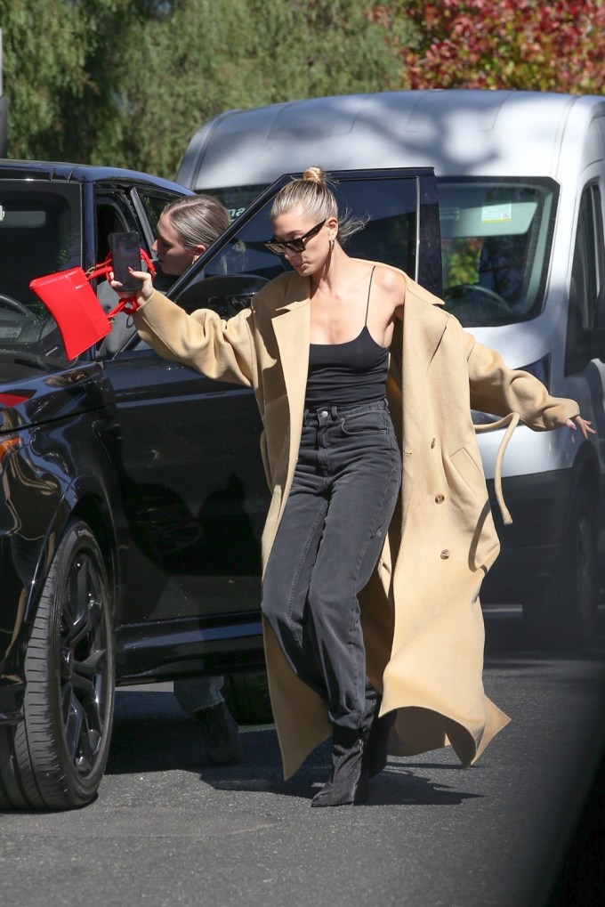 Hailey Bieber almost takes a fall while out with a friend