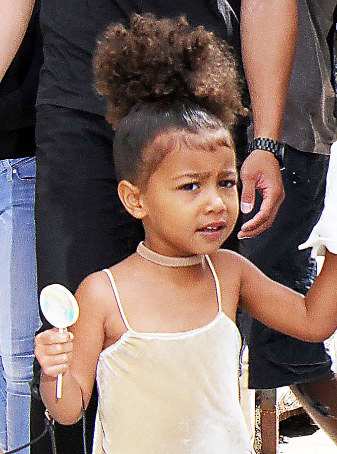 North West sports a voluminous up-do’ in NYC