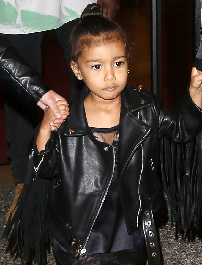 North West opts for a top knot & leather in NYC