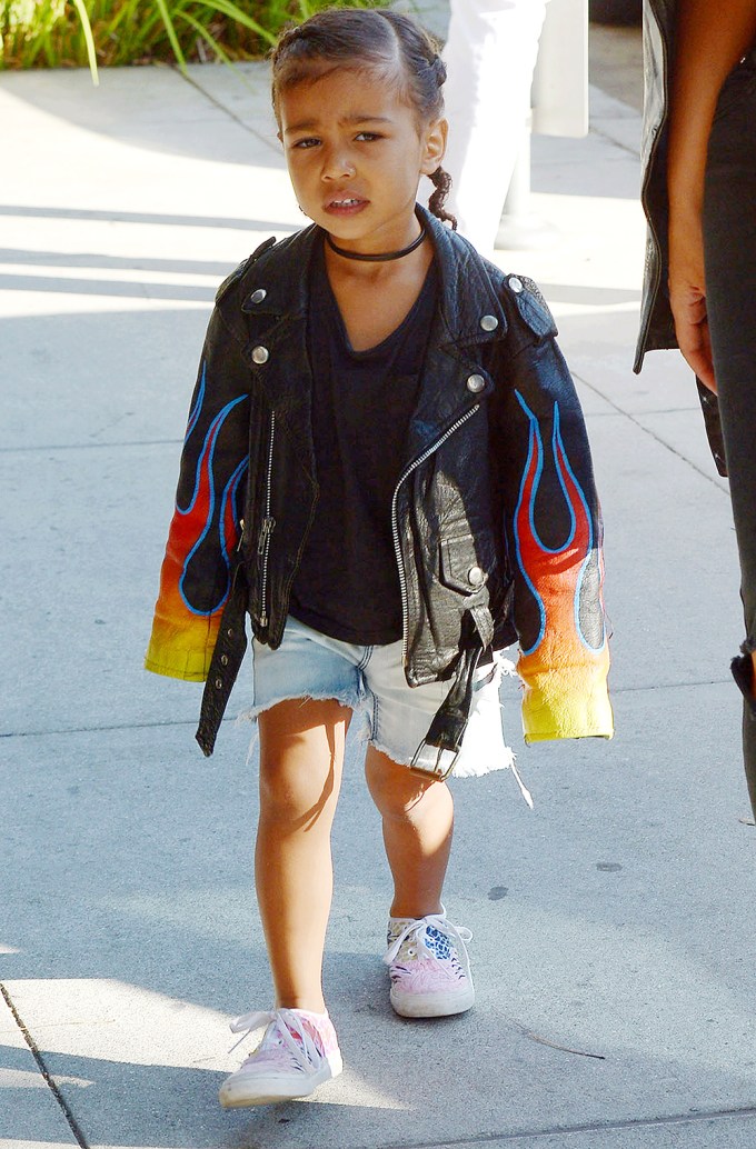 North West sports pigtails & leather in LA
