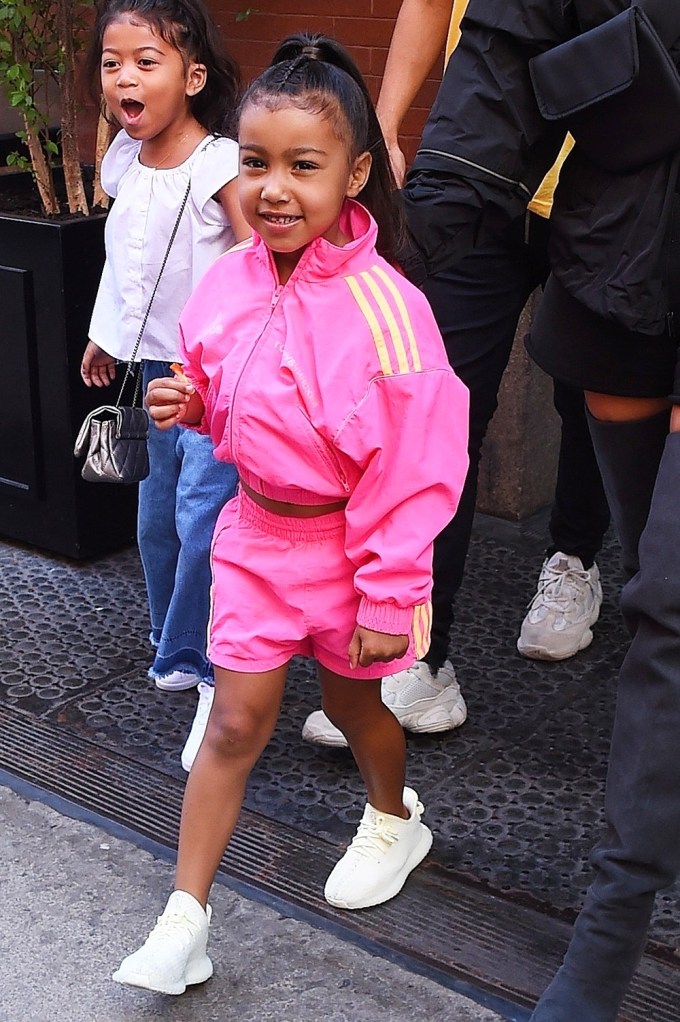 North West rocks a straight ponytail & head-to-toe Adidas