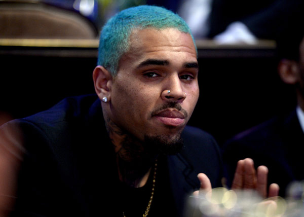 Chris Brown sports bright blue hair