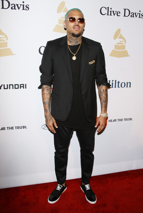 Chris Brown shows off his tattoos at the Pre-Grammy Awards Gala
