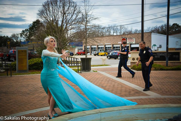 [photos] Queen Elsa Arrested For Causing Cold Weather Hollywood Life