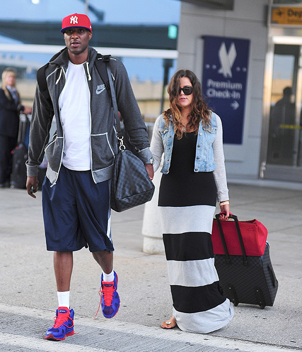 Khloe Kardashian & Lamar Odom walking in New York