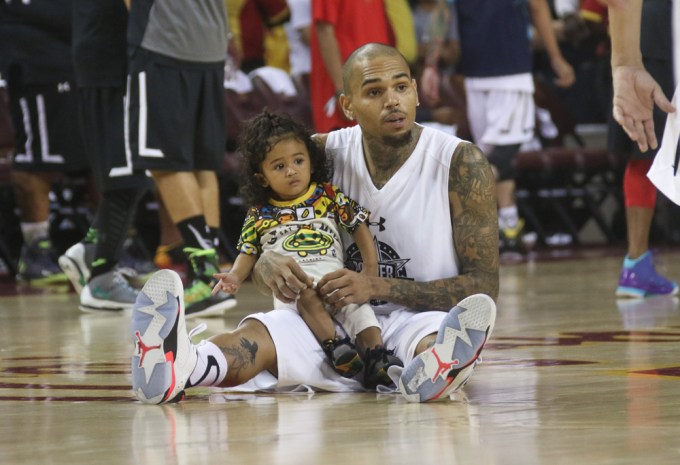 Royalty Brown With Dad Chris At The Power106 Celebrity Basketball Game