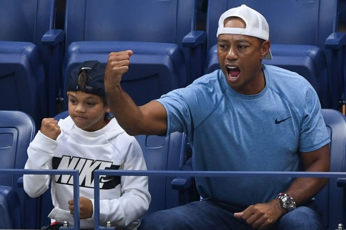 Charlie Woods and Tiger Woods cheer on Serena Williams