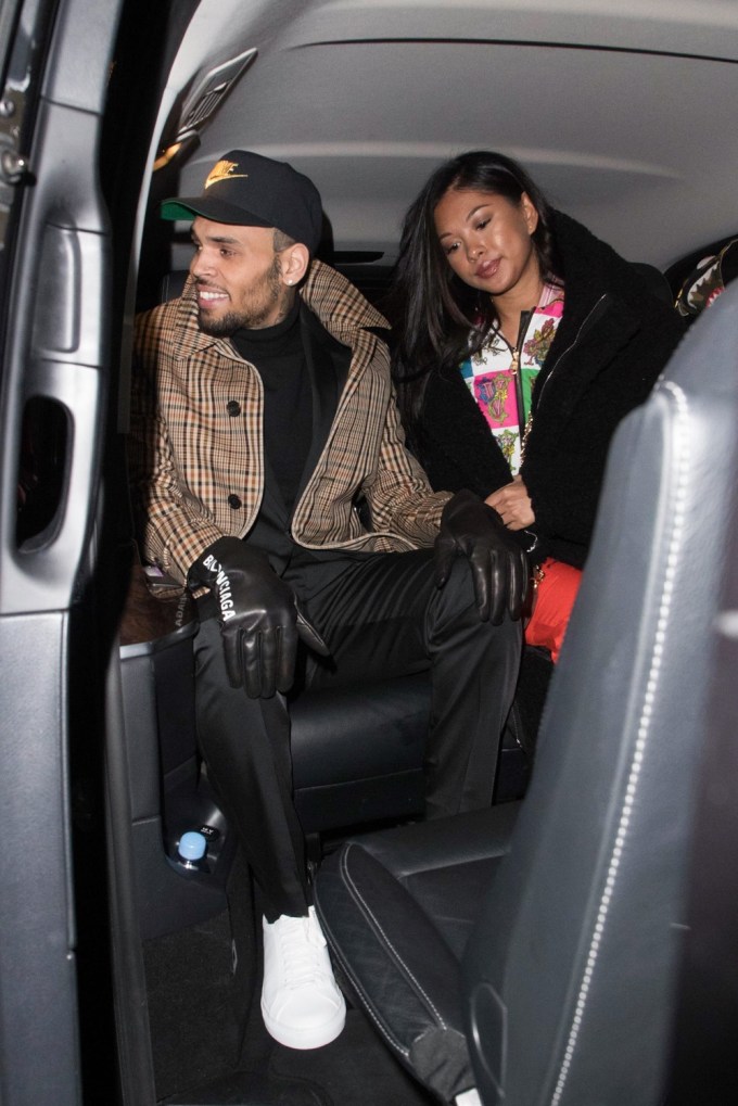 Chris Brown and Ammika Harris Ride In A Car In Paris