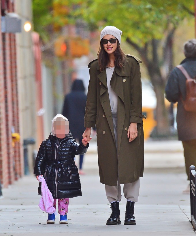 Irina Shayk takes her daughter for a walk in the breezy weather in NYC