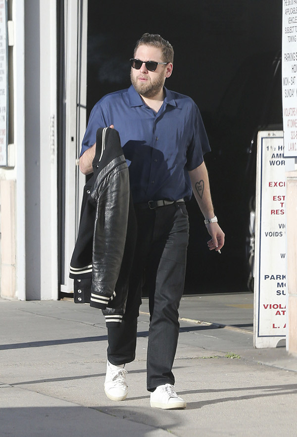 Jonah Hill Carries A Coat In 2017