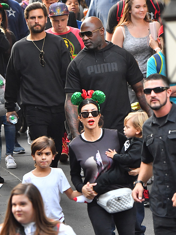 Kourtney Kardashian & Scott Disick Walking Around Disney