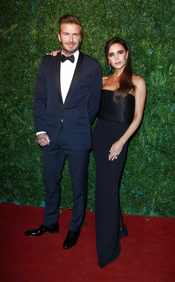Victoria Beckham and David Beckham on a red carpet
