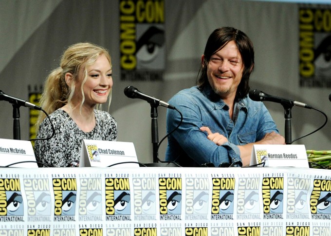 Emily Kinney and Norman Reedus smile during ‘The Walking Dead’ Comic-Con panel