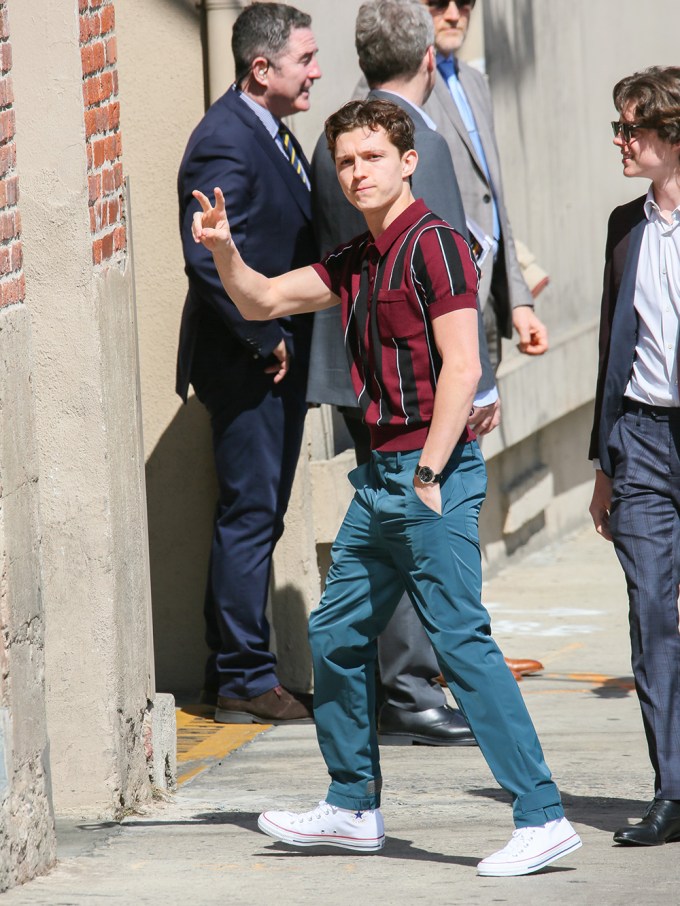Tom Holland gestures to onlookers outside ‘Jimmy Kimmel Live’ 2018