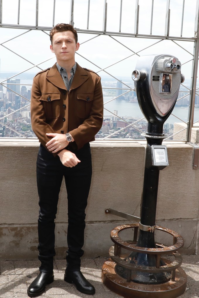 Tom Holland stands on top of the Empire State Building