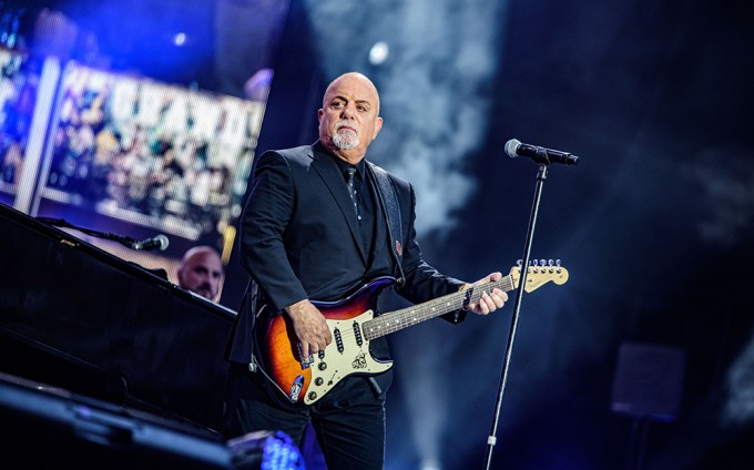 Billy Joel performing in Wembley Stadium