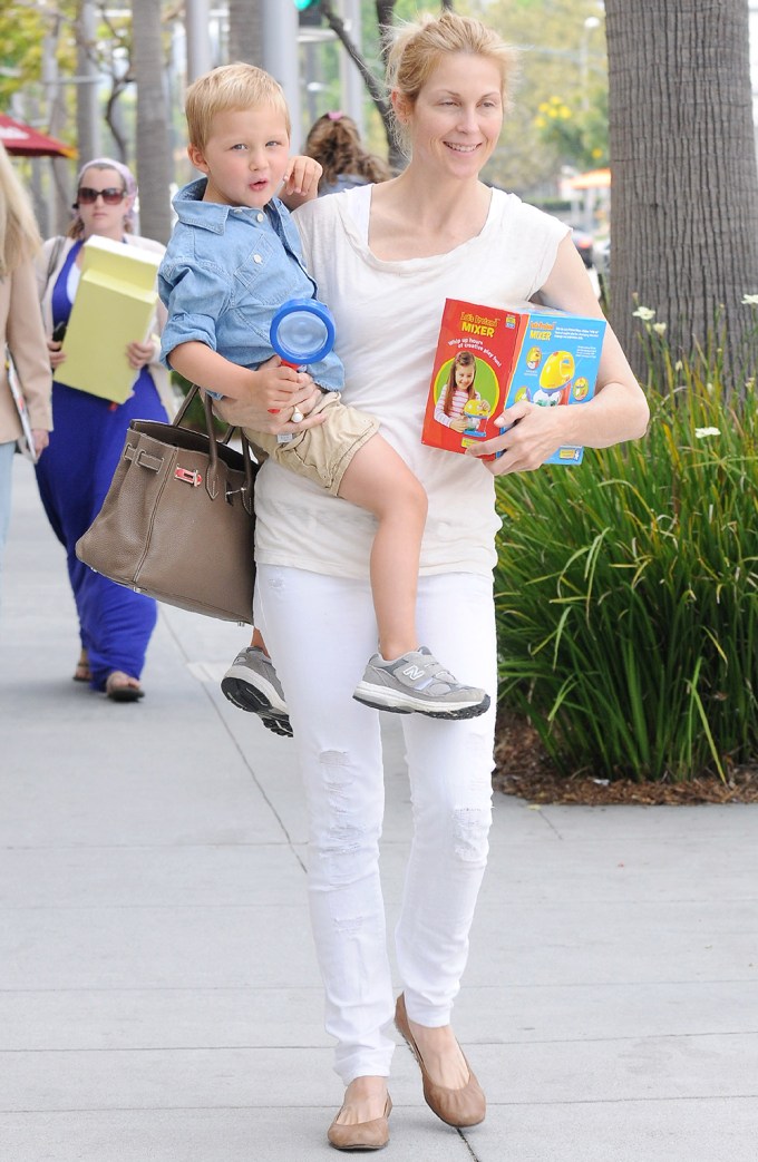 Kelly Rutherford and son Hermes on their way to Madeo Restaurant