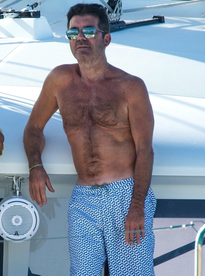 Simon Cowell and Lauren Silverman enjoy a relaxing day at sea aboard a boat in Barbados